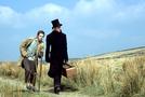 Jamie Bell as Smike and Charlie Hunnam as Nickleby
